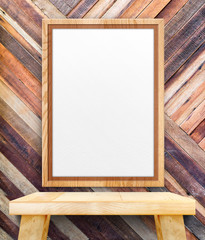 Blank wooden photo frame hanging at diagonal wood wall on wood t