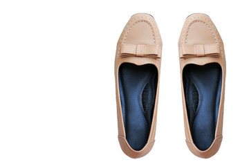 Female brown shoes on a white background.

