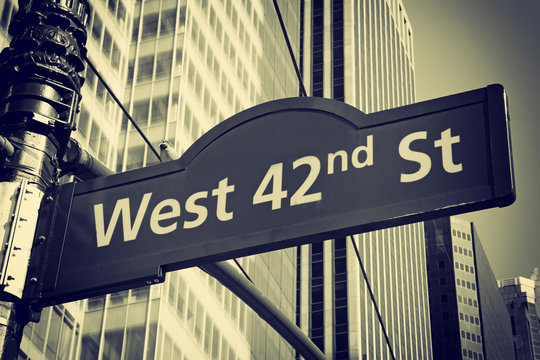 Street signs for West 42nd street in NYC. Edited a s a vintage photo