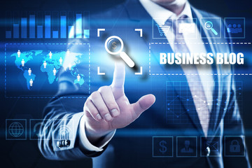 businessman pressing button on virtual screens