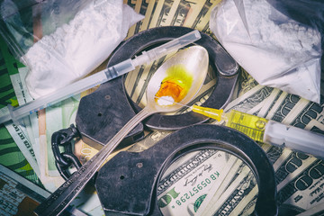 Drug syringe and cooked heroin