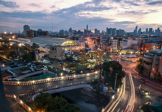 The aerial view of central Bangkok rail station in early morning, foreground is construction site.
