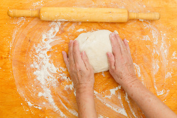 Photography of woman knead dough