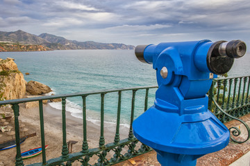 Tourist telescope pointing to  Calahonda beach at Balcon de Euro