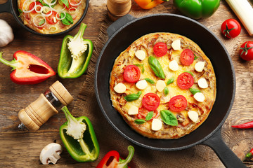 Freshly baked pizza in a pan