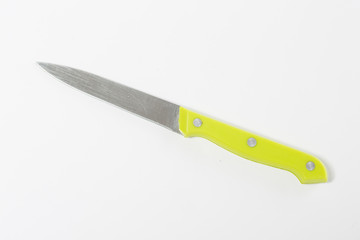 green knife on a white