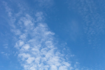 White clouds on a blue sky. Selective focus