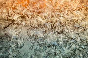 Beautiful nature pattern on frosted glass. Selective focus. Tone