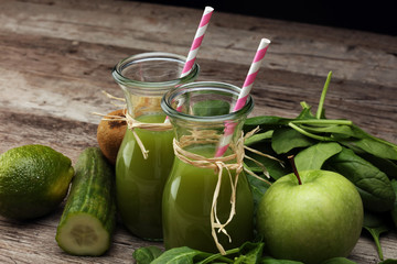 Healthy green smoothie and ingredients - superfoods, detox, diet, health, vegetarian food concept