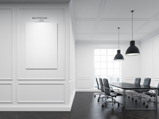 Meeting room with black floor and poster