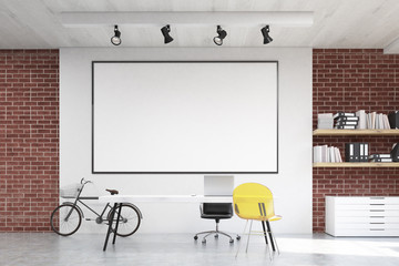 Home office with yellow chair and whiteboard