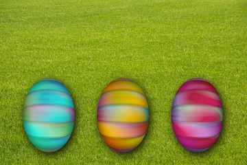Colorful painted Easter eggs on green grass, resurrection holiday background