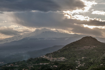 Volcano Etna at sunset, from Taormina, Sicily, Italy