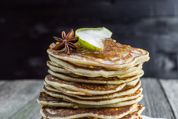 Detail on Whole grain pancakes with pear jam and star anise