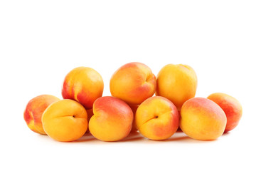 Ripe apricots fruit isolated on a white