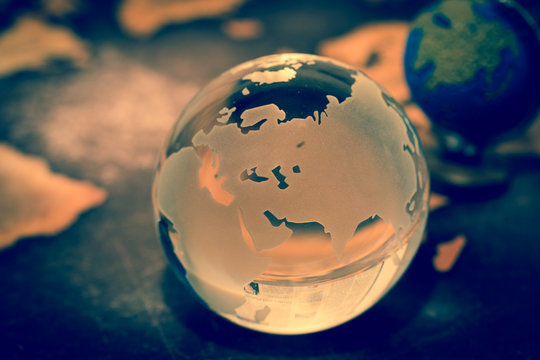 Crystal Globe on Grunge World Map - Powered by Adobe