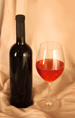 bottle of wine and glass on the table