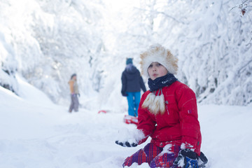 Fototapeta na wymiar Little girl in snowy day