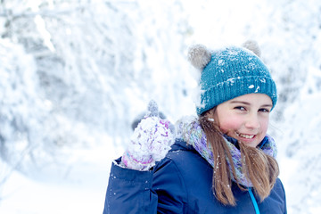 Pretty young girl in winter