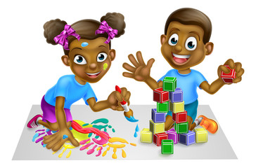 Obraz na płótnie Canvas Boy and Girl Playing with Blocks and Paint