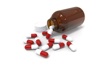 Plastic medicine bottle with cap removed and drug capsules spread over a white background