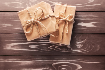 Two gift on the old wooden background