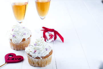 Cupcake with cream and hearts