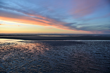 Obraz premium Coucher de soleil sur la côté Belge