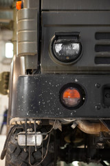 Obraz na płótnie Canvas Head light truck close-up
