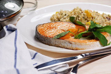 Baked salmon steak with basil