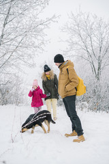 family fun is photographed with a dog