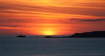 Fototapeta na wymiar Boats at sunset