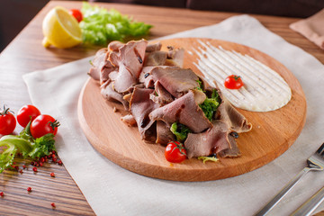 Fine meats with herbs and sauce