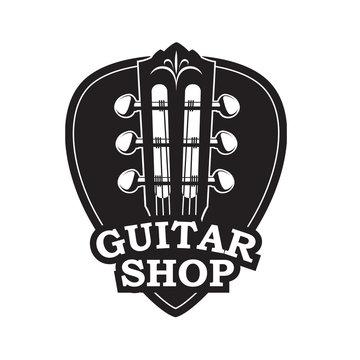 abstract image of guitar neck with black pick