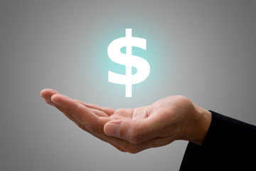 Businessman's hand and power of money