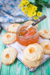 Home-made cookies of kurabie with apricot jam
