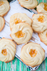 Home-made cookies of kurabie with apricot jam
