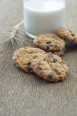 Homemade cookies with milk on the table.
