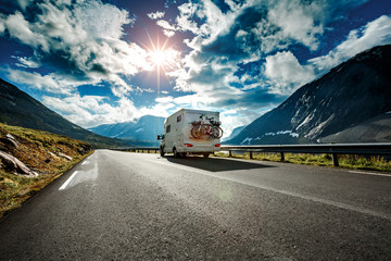Obraz premium Caravan car travels on the highway.