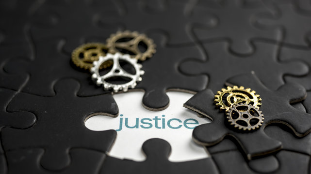 Word Justice Under Jigsaw Puzzle Piece