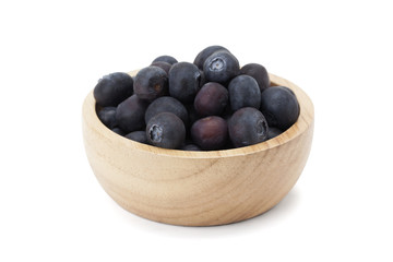 blueberry in wooden bowl