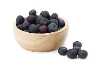 blueberry in wooden bowl