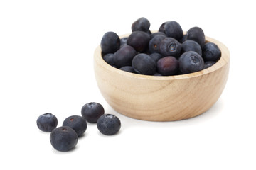 blueberry in wooden bowl