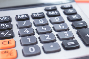 close up business design calculator in work office