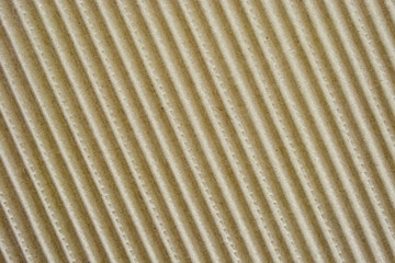 Сorrugated cardboard texture. Coarse surface finish. Fluted packing paper board with big waves.