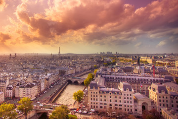 Sunset view across the city of Paris - obrazy, fototapety, plakaty