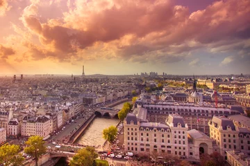 Schilderijen op glas Sunset view across the city of Paris © littleny