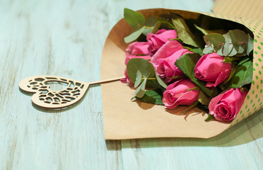 A bouquet of flowers and gifts for the holiday, for lovers, rose for women.