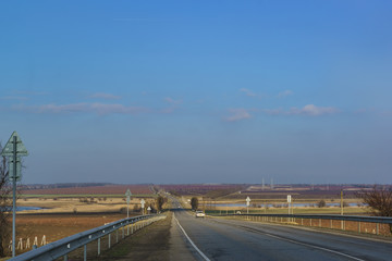 Winter road into the distance over the hills of the Taman Peninsula