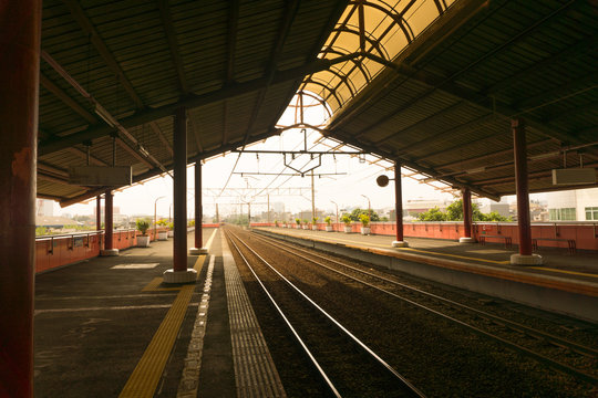 Empty station with many platforms and a sun light photo taken in Jakarta Indonesia